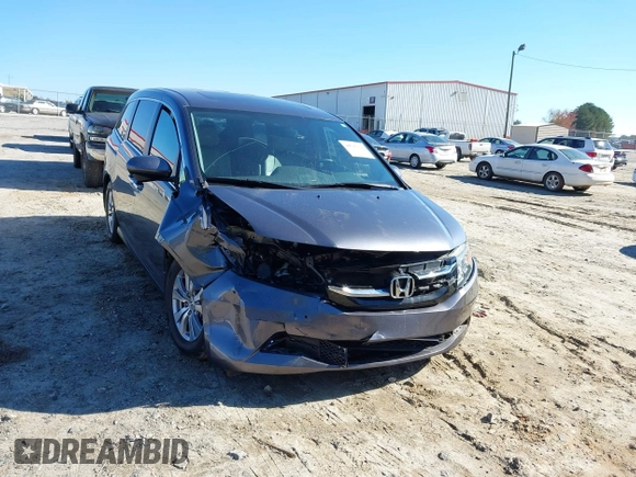 2016 Honda Odyssey EX-L with VIN 5FNRL5H69GB047902, listed as a IAAI auction lot 40795564 with 124,788 mi miles. Bid and sale history available at carsss.com. Image 6.