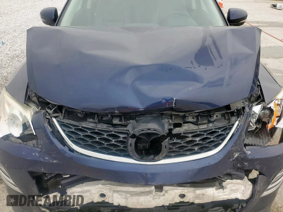 2012 Mazda CX-9 Grand Touring z VIN JM3TB2DA4C0359028, wystawiony jako Copart lot #53816845 z przebiegiem 148 848 mil mil oraz Szkoda całkowita • Salvage title. Historia ofert i sprzedaży dostępna na DreamBid. Obrazek 12.