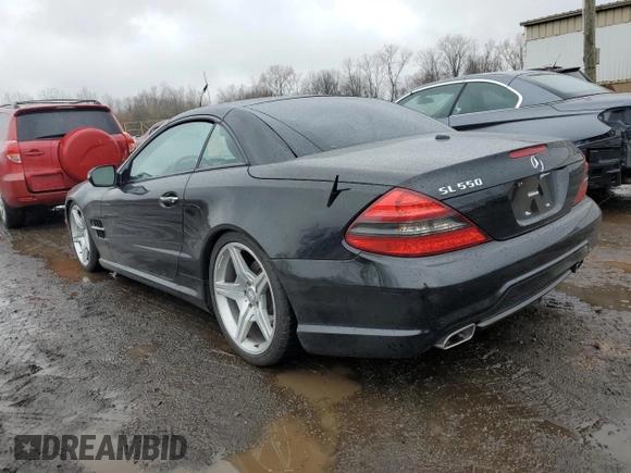 2011 Mercedes-Benz SL 550 with VIN WDBSK7BA8BF165312, listed as a Copart auction lot 51907465 with 32,057 mi miles and Salvage title. Bid and sale history available at DreamBid. Image 2.