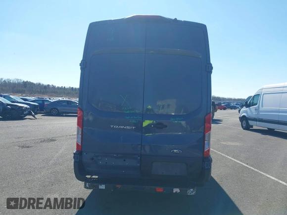 2021 Ford Transit Cargo with VIN 1FTBR3X84MKA54150, listed as a IAAI auction lot 41671756 with 96,556 mi miles and . Bid and sale history available at DreamBid. Image 16.