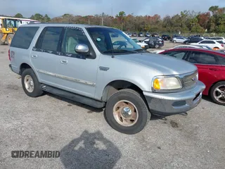 1997 Ford Expedition XLT z VIN 1FMFU18L7VLB17739, wystawiony jako IAAI lot #41426461 z przebiegiem 169 262 mil mil oraz . Historia ofert i sprzedaży dostępna na DreamBid. Obrazek 1.