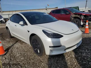 2022 Tesla Model 3 Long Range with VIN 5YJ3E1EB5NF257257, listed as a Copart auction lot 46975105 with 66,089 mi miles and Salvage Title. Bid and sale history available at carsss.com. Image 4.