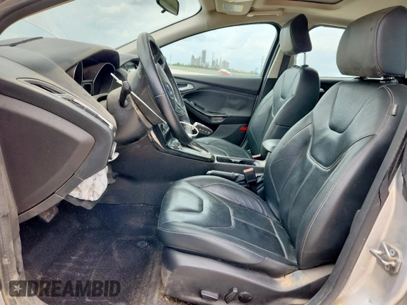 2017 Ford Focus Titanium with VIN 1FADP3N28HL346418, listed as a Copart auction lot 63507125 with 107,761 mi miles and Salvage title. Bid and sale history available at DreamBid. Image 7.