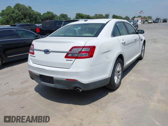 2015 Ford Taurus SE with VIN 1FAHP2D8XFG105029, listed as a IAAI auction lot 42068632 with 164,098 mi miles and . Bid and sale history available at carsss.com. Image 4.