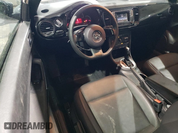 2016 Volkswagen Beetle Wolfsburg Edition with VIN 3VWF17AT3GM602307, listed as a Copart auction lot 56144965 with 63,317 mi miles and Salvage Title. Bid and sale history available at DreamBid. Image 8.