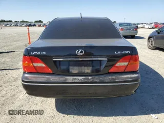 2001 Lexus LS 430 z VIN JTHBN30F710029902, wystawiony jako Copart lot #55810405 z przebiegiem 234 143 mil mil oraz Czysty tytuł • Clean title. Historia ofert i sprzedaży dostępna na DreamBid. Obrazek 6.