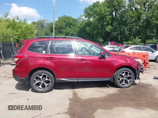 2014 Subaru Forester XT Touring with VIN JF2SJGMC9EH552996, listed as a IAAI auction lot 42540898 with 145,932 mi miles and . Bid and sale history available at DreamBid. Image 14.
