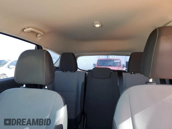 2017 Ford Escape S with VIN 1FMCU0F77HUC67545, listed as a Copart auction lot 56861555 with 228,117 mi miles and Salvage title. Bid and sale history available at DreamBid. Image 10.