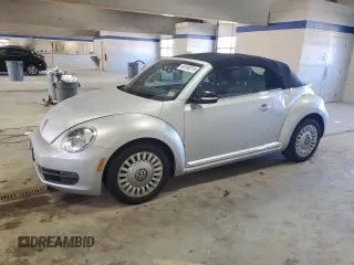 2013 Volkswagen Beetle 2.5L with VIN 3VW5P7AT4DM814283, listed as a Copart auction lot 50150215 with 117,798 mi miles and Salvage Title. Bid and sale history available at DreamBid. Image 1.