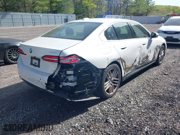 2024 BMW 5 Series 530i xDrive with VIN WBA53FJ06RCR29262, listed as a IAAI auction lot 42157428 with 27,918 mi miles and . Bid and sale history available at DreamBid. Image 4.