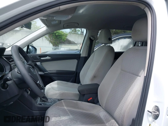 2018 Volkswagen Tiguan S with VIN 3VV1B7AX8JM032990, listed as a IAAI auction lot 42279807 with 74,185 mi miles and . Bid and sale history available at DreamBid. Image 19.