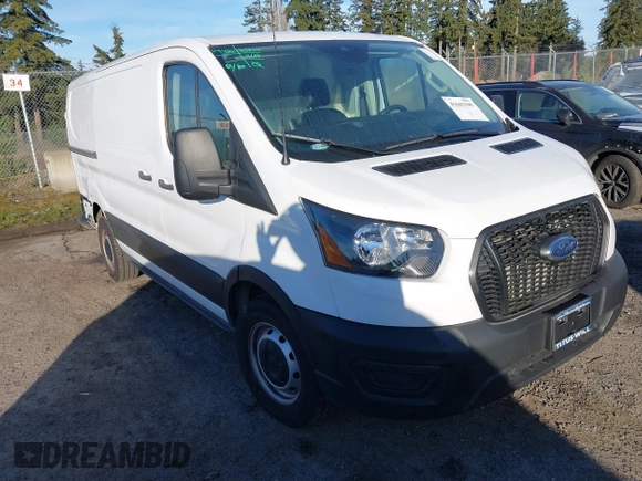 2021 Ford Transit Cargo z VIN 1FTYE1Y89MKA16809, wystawiony jako IAAI lot #41643195 z przebiegiem 7 407 mil mil oraz . Historia ofert i sprzedaży dostępna na DreamBid. Obrazek 1.