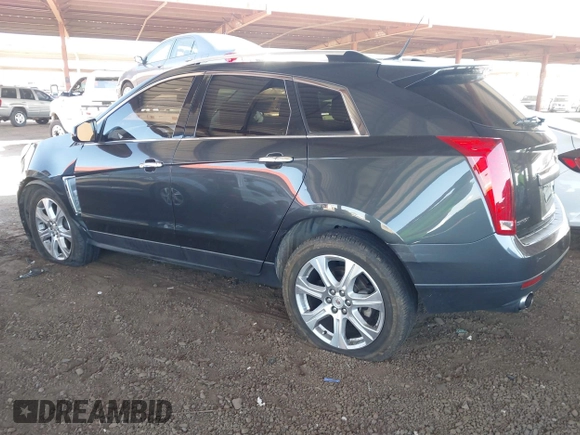 2014 Cadillac SRX Premium Collection z VIN 3GYFNDE31ES653114, wystawiony jako IAAI lot #42107858 z przebiegiem 125 192 mil mil oraz . Historia ofert i sprzedaży dostępna na DreamBid. Obrazek 3.