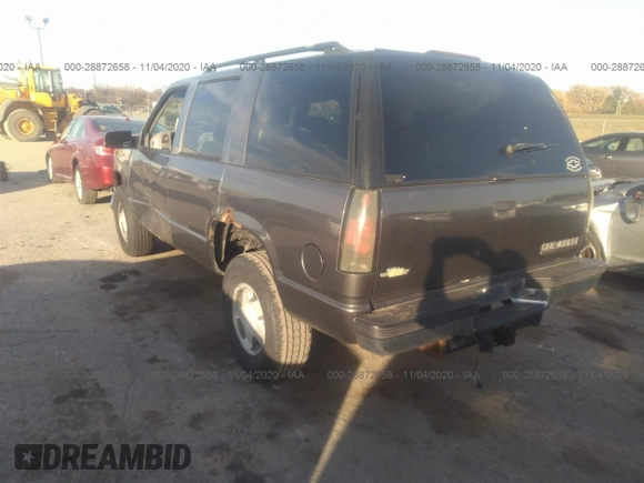 1999 Chevrolet Tahoe Z71 with VIN 1GNEK13R7XJ528100, listed as a IAAI auction lot 28872658 with 158,958 mi miles and . Bid and sale history available at DreamBid. Image 3.