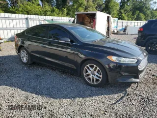 2015 Ford Fusion SE with VIN 3FA6P0HD4FR276080, listed as a Copart auction lot 62287435 with 137,095 mi miles and Salvage title. Bid and sale history available at DreamBid. Image 4.