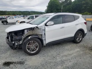 2018 Hyundai Santa Fe 2.4L with VIN 5NMZU3LB6JH104469, listed as a Copart auction lot 57587495 with 78,267 mi miles and Salvage title. Bid and sale history available at DreamBid. Image 1.