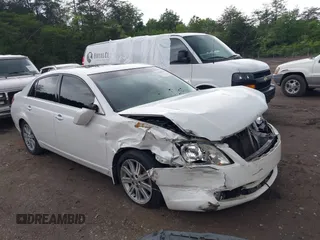 2005 Toyota Avalon XL z VIN 4T1BK36B65U032377, wystawiony jako IAAI lot #42100475 z przebiegiem Nie podano mil oraz . Historia ofert i sprzedaży dostępna na DreamBid. Obrazek 1.