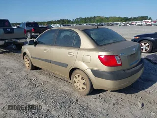 2007 Kia Rio LX with VIN KNADE123176203130, listed as a IAAI auction lot 41982135 with 221,702 mi miles. Bid and sale history available at carsss.com. Image 3.