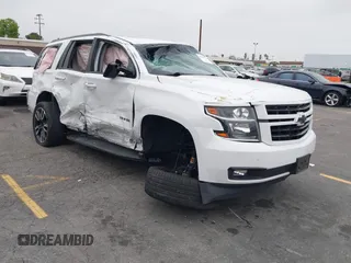 2018 Chevrolet Tahoe Premier z VIN 1GNSKCKJ6JR252253, wystawiony jako IAAI lot #42354486 z przebiegiem Nie podano mil oraz . Historia ofert i sprzedaży dostępna na DreamBid. Obrazek 1.