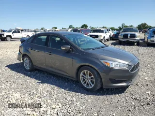 2015 Ford Focus SE с VIN 1FADP3F21FL348264, выставлен на аукционе Copart как лот 46108025 с пробегом 196 031 миль миль и Списание • Salvage title. История ставок и продаж доступна на DreamBid. Изображение 4.