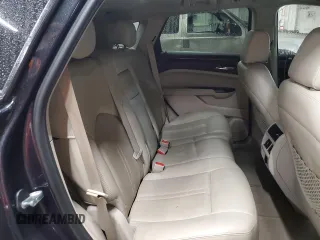 2016 Cadillac SRX Luxury Collection z VIN 3GYFNEE30GS583467, wystawiony jako Copart lot #57831135 z przebiegiem 139 890 mil mil oraz Szkoda całkowita • Salvage title. Historia ofert i sprzedaży dostępna na DreamBid. Obrazek 11.