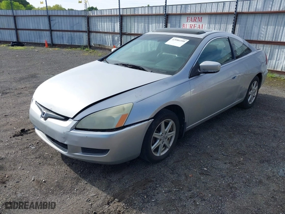 2004 Honda Accord Cpe EX with VIN 1HGCM82664A010907, listed as a IAAI auction lot 42086599 with 215,595 mi miles. Bid and sale history available at carsss.com. Image 2.