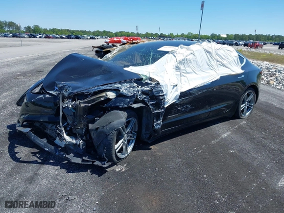 2019 Tesla Model 3 Long Range with VIN 5YJ3E1EBXKF208941, listed as a IAAI auction lot 40259510 with 80,971 mi miles. Bid and sale history available at carsss.com. Image 16.