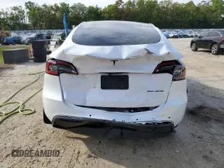 2022 Tesla Model Y Long Range with VIN 7SAYGDEE4NF398710, listed as a Copart auction lot 50510375 with 46,430 mi miles and Non Repairable. Bid and sale history available at DreamBid. Image 6.
