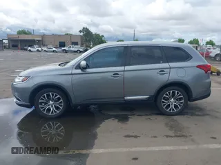 2018 Mitsubishi Outlander SE with VIN JA4AD3A31JZ016055, listed as a IAAI auction lot 42245714 with 97,448 mi miles and . Bid and sale history available at DreamBid. Image 14.