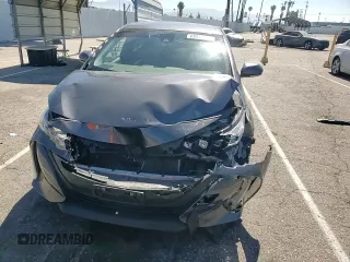 2021 Toyota Prius LE with VIN JTDKAMFP5M3177018, listed as a Copart auction lot 63930405 with 58,439 mi miles and Salvage title. Bid and sale history available at DreamBid. Image 13.
