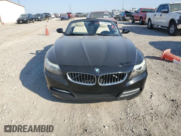 2012 BMW Z4 sDrive28i with VIN WBALL5C5XCE716711, listed as a Copart auction lot 75706534 with 89,948 mi miles and Clean Title. Bid and sale history available at carsss.com. Image 5.