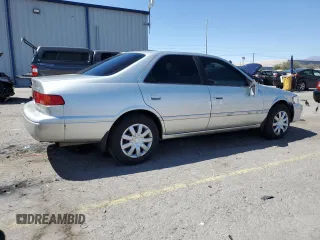 2000 Toyota Camry CE with VIN JT2BG22KXY0492183, listed as a Copart auction lot 52596705 with 181,840 mi miles and Salvage Title. Bid and sale history available at carsss.com. Image 3.
