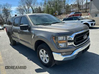 2023 Ford F-150 XL with VIN 1FTEW1EP1PFA41180, listed as a Copart auction lot 53303335 with 11,220 mi miles and Salvage Title. Bid and sale history available at carsss.com. Image 4.