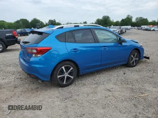 2022 Subaru Impreza Premium with VIN 4S3GTAV60N3711910, listed as a Copart auction lot 60787035 with 58,828 mi miles and Salvage title. Bid and sale history available at DreamBid. Image 3.