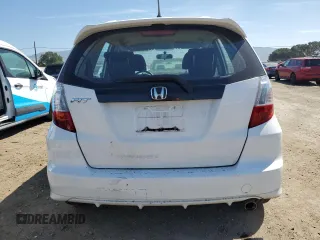 2012 Honda Fit Sport with VIN JHMGE8H50CC009958, listed as a Copart auction lot 55423075 with 117,618 mi miles and Salvage Title. Bid and sale history available at DreamBid. Image 6.