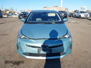 2018 Toyota Prius Two with VIN JTDKBRFU3J3583259, listed as a IAAI auction lot 40688951 with 197,642 mi miles and . Bid and sale history available at DreamBid. Image 12.