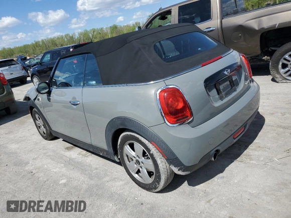 2016 MINI Convertible with VIN WMWWG5C57G3C19380, listed as a Copart auction lot 50645324 with 76,396 mi miles and Salvage title. Bid and sale history available at DreamBid. Image 2.