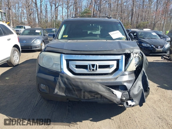 2011 Honda Pilot EX-L with VIN 5FNYF4H69BB015375, listed as a IAAI auction lot 41826235 with 199,171 mi miles and . Bid and sale history available at carsss.com. Image 12.