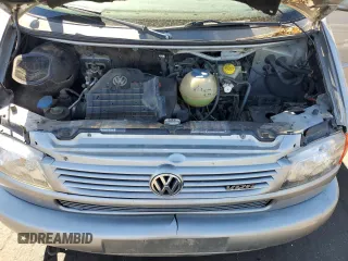 2000 Volkswagen EuroVan с VIN WV2MH4701YH133906, выставлен на аукционе Copart как лот 72370794 с пробегом Не указан миль и Чистый • Clean title. История ставок и продаж доступна на DreamBid. Изображение 12.