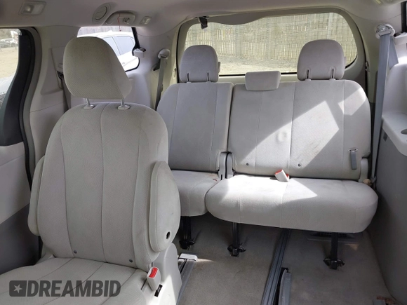 2012 Toyota Sienna with VIN 5TDKA3DC9CS011298, listed as a IAAI auction lot 41843980 with 158,787 mi miles and . Bid and sale history available at DreamBid. Image 8.