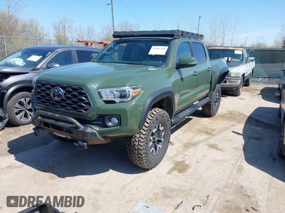 2021 Toyota Tacoma 4WD SR with VIN 3TMCZ5ANXMM382874, listed as a IAAI auction lot 41965388 with 62,178 mi miles. Bid and sale history available at carsss.com. Image 2.