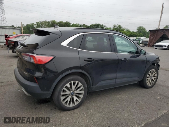 2021 Ford Escape Titanium with VIN 1FMCU9J97MUA58524, listed as a Copart auction lot 61045765 with 91,575 mi miles and Clean title. Bid and sale history available at DreamBid. Image 3.