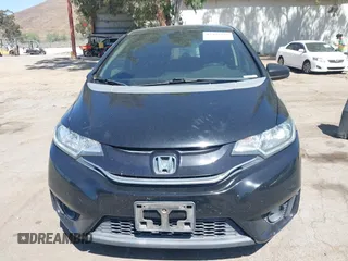 2015 Honda Fit EX-L z VIN 3HGGK5H88FM706513, wystawiony jako IAAI lot #42493772 z przebiegiem 173 129 mil mil oraz . Historia ofert i sprzedaży dostępna na DreamBid. Obrazek 13.