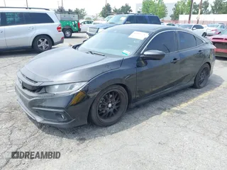 2021 Honda Civic Sport with VIN 2HGFC2F88MH557221, listed as a IAAI auction lot 42161778 with 101,956 mi miles and . Bid and sale history available at DreamBid. Image 22.