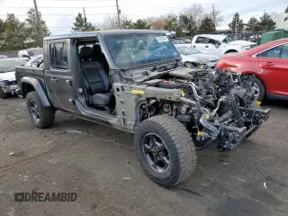 2021 Jeep Gladiator Rubicon with VIN 1C6JJTBG4ML504141, listed as a Copart auction lot 43367565 with 56,879 mi miles and Salvage title. Bid and sale history available at DreamBid. Image 4.