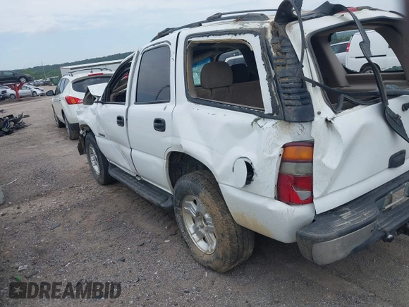 2002 Chevrolet Tahoe LT with VIN 1GNEC13Z52J341962, listed as a IAAI auction lot 42391522 with 239,452 mi miles and . Bid and sale history available at DreamBid. Image 3.