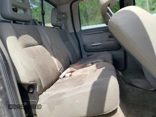 2006 Mitsubishi Raider Duro Cross z VIN 1Z7HC38K26S576434, wystawiony jako Copart lot #53798965 z przebiegiem 198 820 mil mil oraz Szkody całkowita. Historia ofert i sprzedaży dostępna na DreamBid. Obrazek 10.