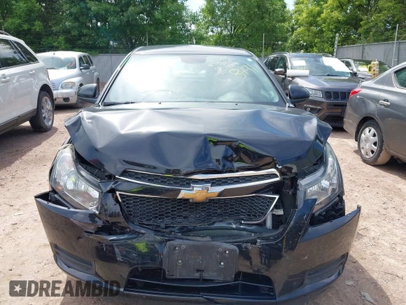 2014 Chevrolet Cruze 1LT with VIN 1G1PC5SB5E7433631, listed as a IAAI auction lot 42518491 with 99,962 mi miles and . Bid and sale history available at DreamBid. Image 12.