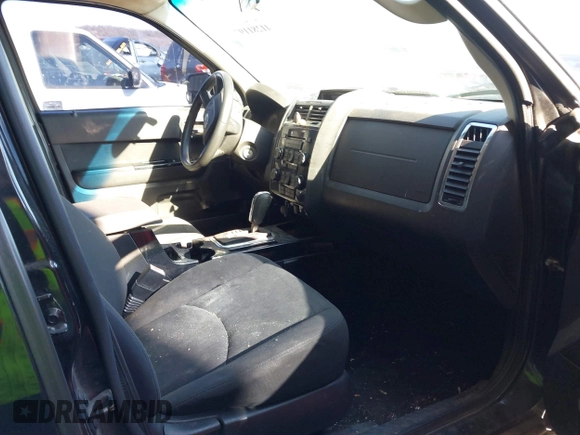 2011 Mazda Tribute Sport with VIN 4F2CY9C7XBKM06202, listed as a IAAI auction lot 41281197 with 195,443 mi miles and . Bid and sale history available at DreamBid. Image 5.