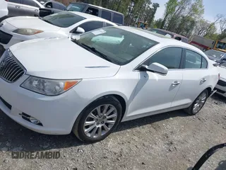 2013 Buick LaCrosse Premium 1 z VIN 1G4GF5E32DF268639, wystawiony jako IAAI lot #41934122 z przebiegiem 176 276 mil mil oraz . Historia ofert i sprzedaży dostępna na DreamBid. Obrazek 14.